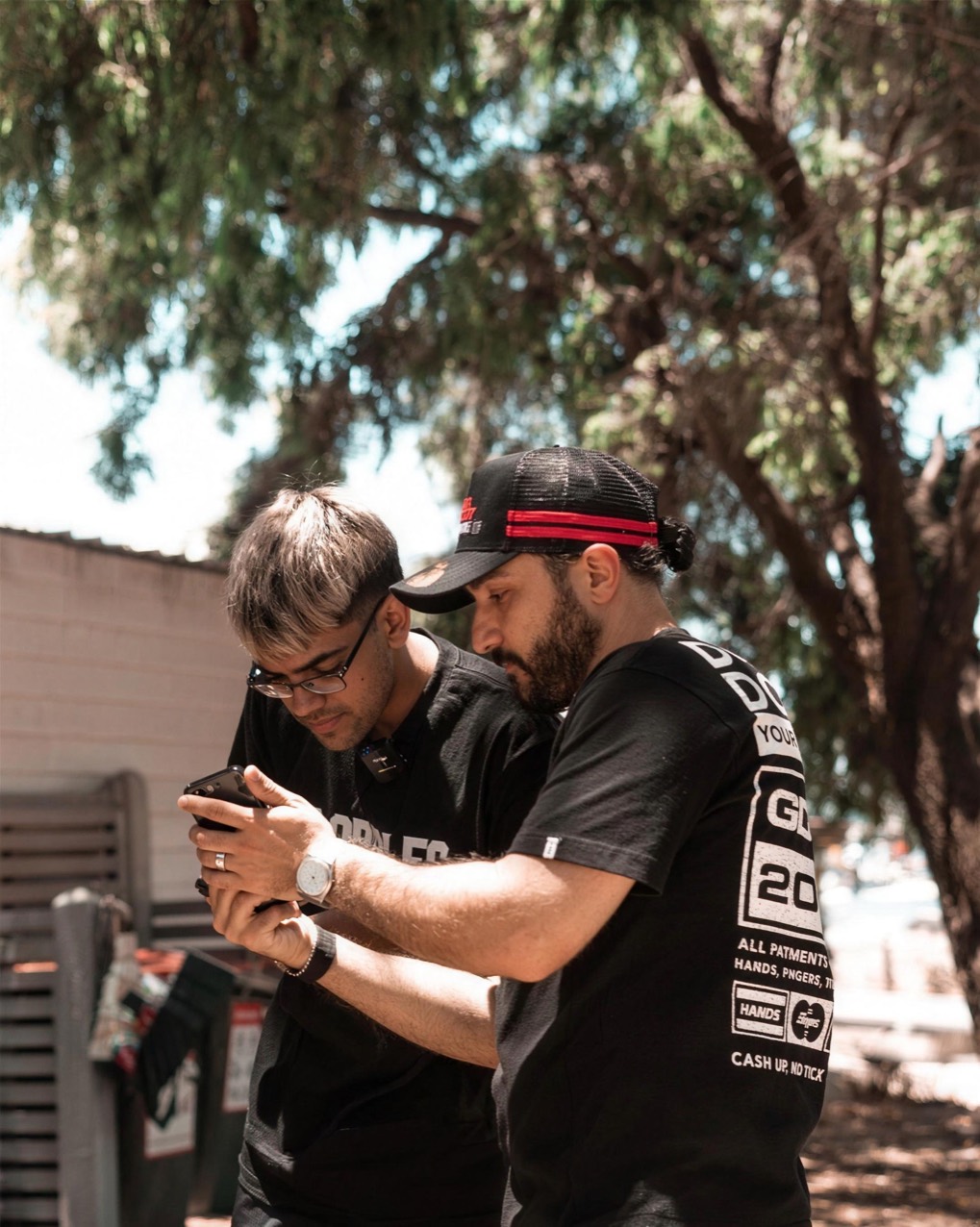 The Lleggo team reviewing footage on the Neon Australian tour
